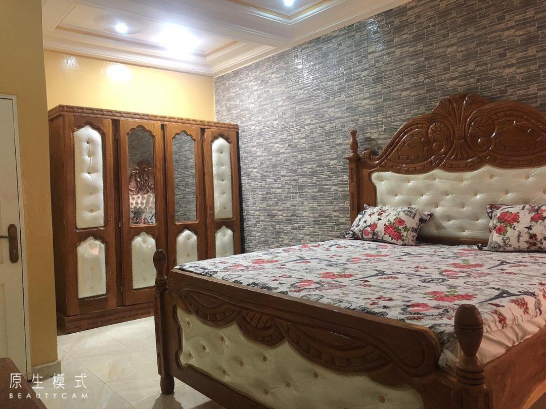 Awamuulamin Manneh Guest House Abuko Buitenkant foto