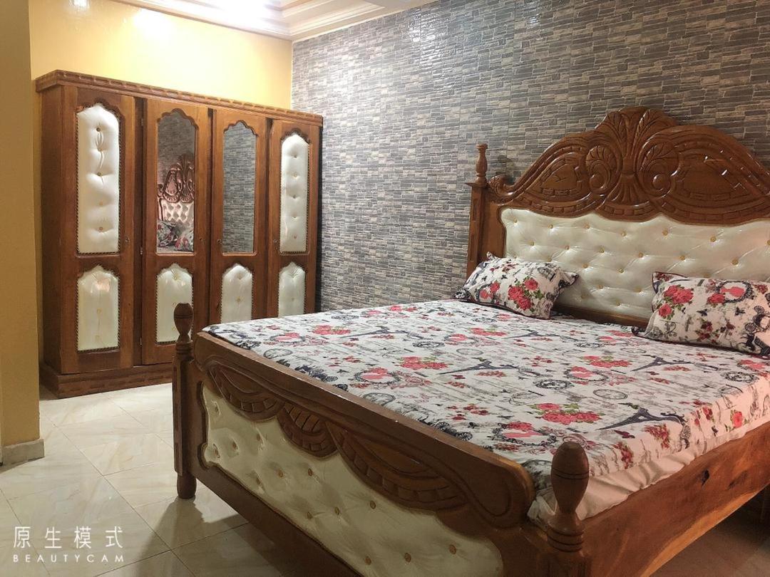 Awamuulamin Manneh Guest House Abuko Buitenkant foto
