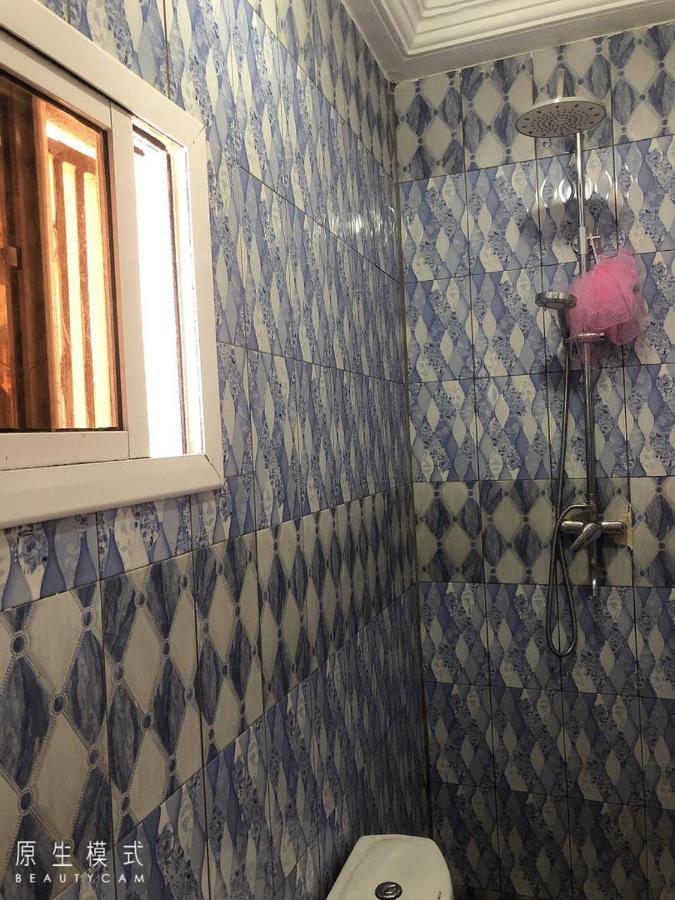 Awamuulamin Manneh Guest House Abuko Buitenkant foto